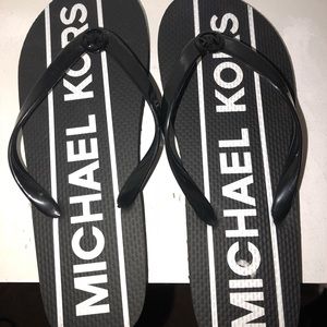 Michael Korda Flip Flops